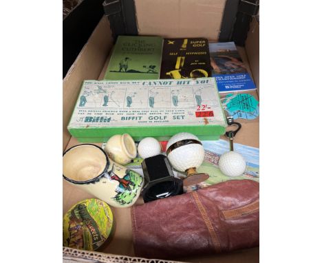 A box of golfing related items and collectables including golf ball table lighter, Biffit golf set, books, pottery items etc.