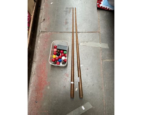 A vintage miniature billiard set with 2 cues 