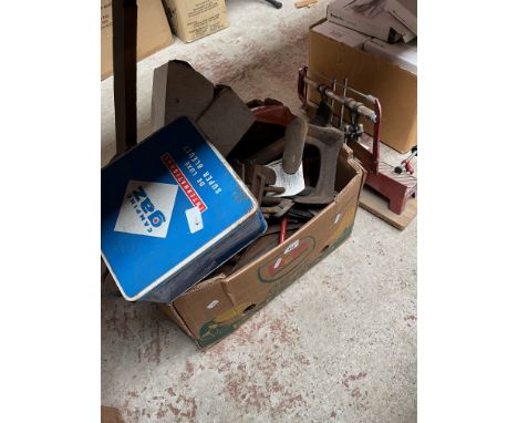 A box of tools, camping gas stove, cross cut saw, weights, etc 