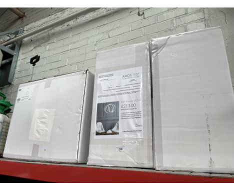 A pair of boxed Dar Alonsa LED light fittings, new and unused. 