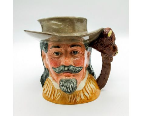 Light brown hat and buckskin jacket.Series: The Wild West Collection. Royal Doulton backstamp. Artist: Robert TabbenorIssued: