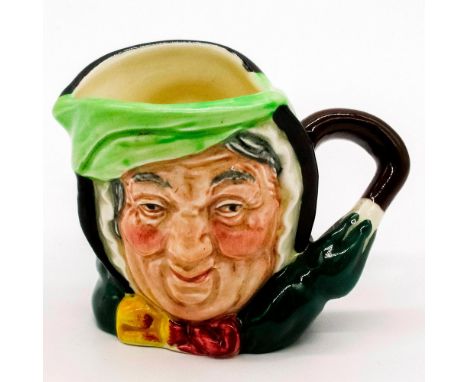 Black hair; light green band; dark green coat; yellow and burgundy bow.Royal Doulton backstamp. Good condition. #royaldoulton