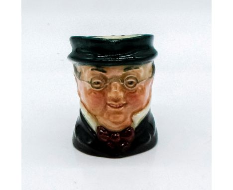 Style One, plain handle. Green hat and coat; maroon bow tie.Founder and chairman of the Pickwick Club, this gentleman is the 