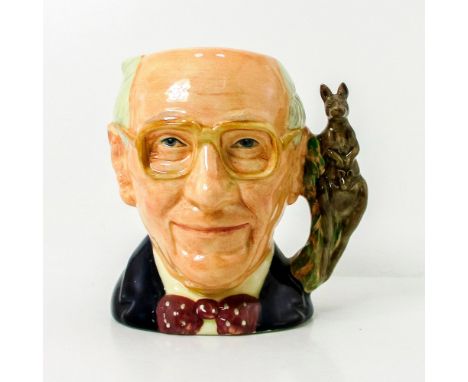 Grey hair; black jacket; maroon and white polka-dot.Royal Doulton and CJCSA backstamp. Artist: William K. HarperIssued: 1991D