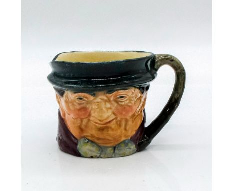 Dark grey hat; maroon coat; grey-white bow with yellow spots.Series: Charles Dickens' Characters. Royal Doulton backstamp. Ar