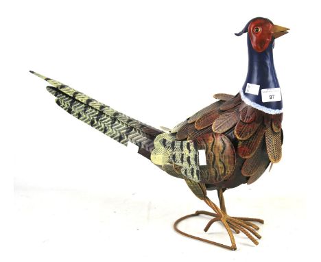 A contemporary pressed metal painted pheasant figurine. H37cm