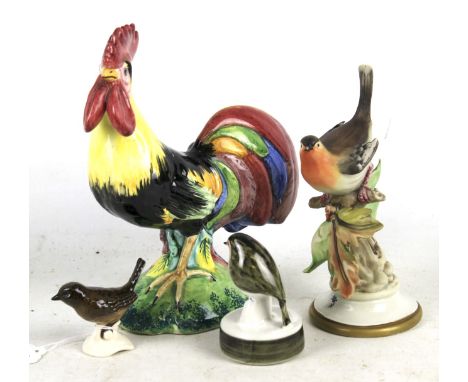 Four ceramic birds. Comprising a Capodimonte robin, a Rye pottery robin, a Goebel wren and an Italian chicken, tallest H21.5c