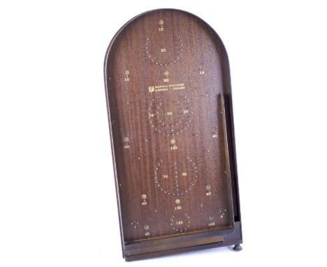 A vintage wooden bagatelle board. L75cm