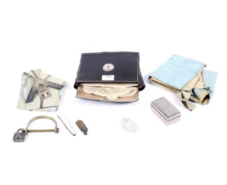 An assortment of mixed collectables. Including enamel buckle, Masonic bike lock, apron in an original Mason's case, etc.