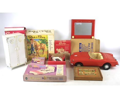 A collection of assorted vintage toys and games. Including Pedigree Sindy doll accessories 'wardrobe' boxed, 'bedside table a