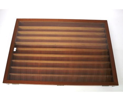 A teak wall mounted model train display cabinet. With nine shelves, 106cm x 76cm