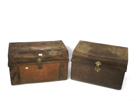 Two vintage riveted tin travelling trunks. L67cm x D47cm x H44cm 