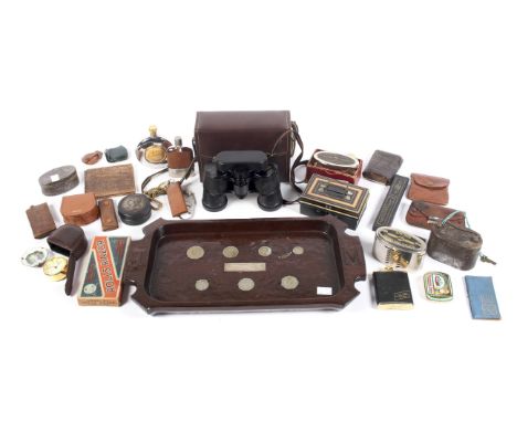 An assortment of collectables. Including hip flasks, boxed razors, Barclays 'Home Safe', wallets, a Victorian snuff box, pair