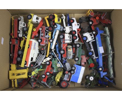 An assortment of playworn diecast model vehicles. Including cars, emergency vehicles and industrial vehicles, some examples b