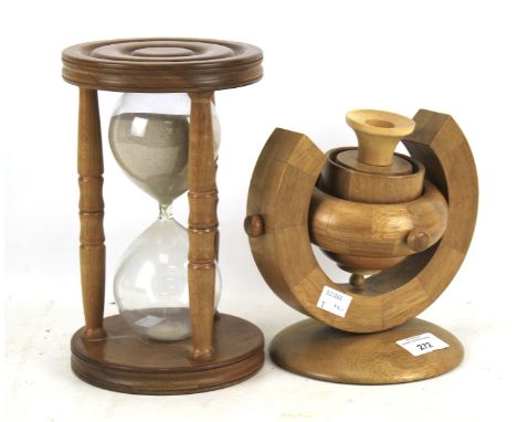 A handmade wooden lamp base and sand timer. The timer with turned supports, H23cm, the lamp base of adjustable design and on 