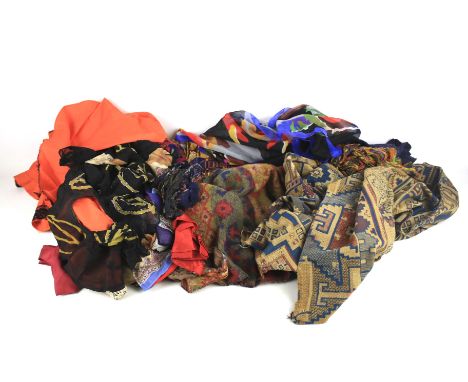 A collection of vintage scarves. Including silk and cotton examples, in a variety of sizes and designs