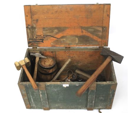 A wooden tool box and a collection of vintage hand tools. An old ammo box with hinged lid, several wheelwright/cooper's hamme