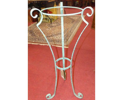 A contemporary wrought metal green patinated jardiniere stand, lacking planter, height 97.5cm