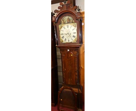 An early 19th century mahogany and flame mahogany longcase clock having an arched painted dial, signed T Ayres, Yarmouth, twi