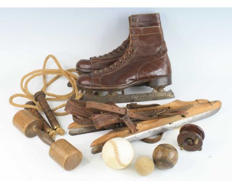 A collection of assorted sporting equipment to include a pair of The Frank Wooley Guard pneumatic cricket pads by H. Gradidge