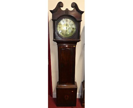 An early 19th centruy oak and mahogany cross banded longcase clock, the circular silvered dial signed Thomas Scott, Gainsbrou