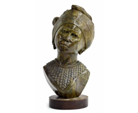 Edward Ndoro, Zimbabwe born 1973 -&nbsp;a carved stone figural bust sculpture of an African tribal lady, possibly of the Shon