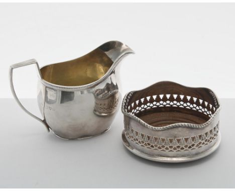 George V silver cream jug, of helmet shape cast with a textured border and the interior gilt, maker&nbsp;Sampson Mordan &amp;