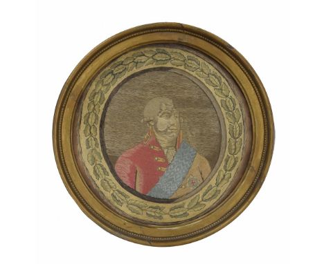 English School (18th/19th century) - A needlework depicting George III, head and shoulders wearing a coat, silk sash and roya