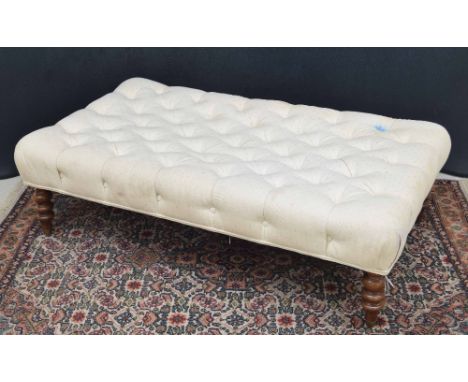 Large rectangular button upholstered stool, in cream, raised on turned legs, 51" wide, 30" deep, 15" high (ink stain to uphol