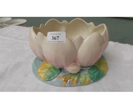 Clarice Cliff flower vase, the oval pink petal bowl on multi-coloured plinth