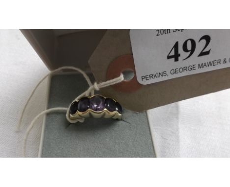 9 ct. gold five stone amethyst ring (size M)