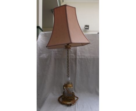 Brass and glass table lamp with pink parchment shade