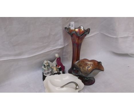 Fairing Group ornament and a lustre Carnival glass specimen vase and sugar basin