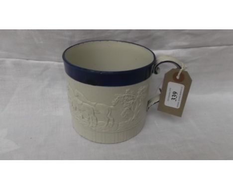 Leaf moulded stoneware mug (4" x 4 /12"), hunting scene, canthus leaf moulding on top of handle believed Chetham & Woolley 