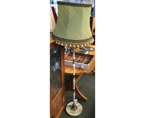 An onyx standard lamp with shade 
