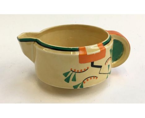 A Clarice Cliff Art Deco Bizarre Ravel pattern jug, with printed factory marks 