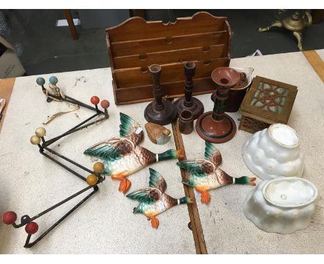 A mixed lot to include letter rack, turned wood candlesticks, three ceramic ducks in flight, two jelly moulds, etc 