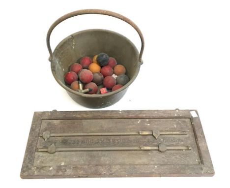 A set of vintage snooker balls, snooker scoring board, and three vintage cues, together with a copper and brass pot 