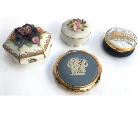 A Stratton Wedgwood blue Jasperware compact; together with a floral encrusted lidded trinket pot marked to base with undergla