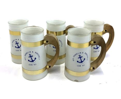 A set of five vintage Siesta Ware glass tankards with wooden handles, reads 'USS Franklin D. Roosevelt (CVA - 42), 13cmH 