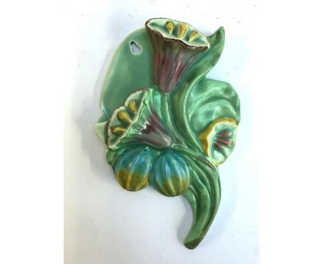 A Clarice Cliff Bizarre wall pocket 409 spray of lillies in green/purple colourway, with printed factory marks 