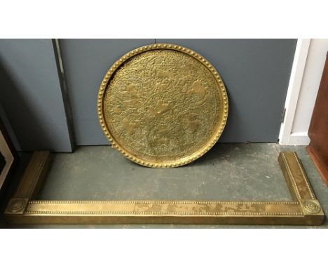 A heavy brass fire surround with bead moulding and rosette decoration, 130cmW; together with an Indian brass tray, 61cmD 