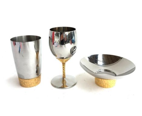 A stainless steel goblet, bowl, and tumbler by Stuart Devlin for Viners 