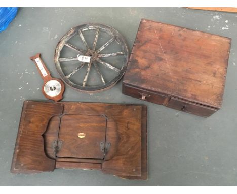 A small banjo barometer, together with a spoked vintage wagon wheel cartwheel, 45cmD; A vintage mahogany two drawer stationar