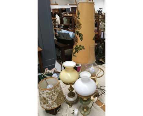 Three oil-lamp style table lamps, together with two others 