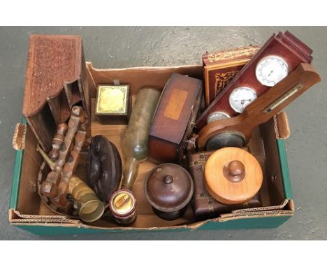 A mixed lot include Treenware, a bakelite ashtray, ship in bottle, ceramic cigarette light, barometers, etc 