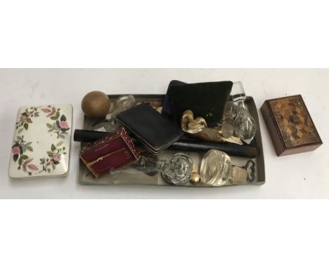 A mixed lot of small interesting things to include decanter stoppers, sovereign holder, ebony baton, brooches, card case with