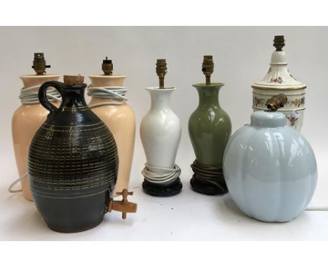 Six ceramic table lamps, together with a cider flagon with tap 