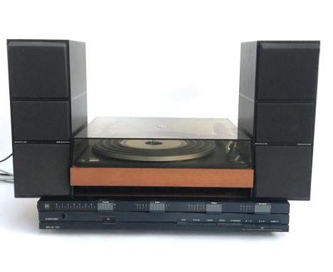 A Bang &amp; Olufsen 1001 Beogram turntable; a Beolab 1700 amplifier; and a pair of Beovox CX100 speakers 
