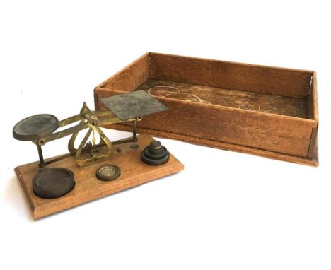 A 19th century oak desk tray, together with a small set of scales with weights, marked 'Warranted Accurate' 
